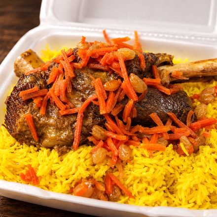 Lamb Shank Over Rice